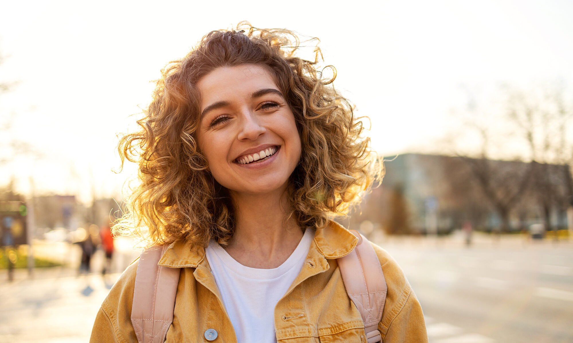 Woman smiling outdoors
